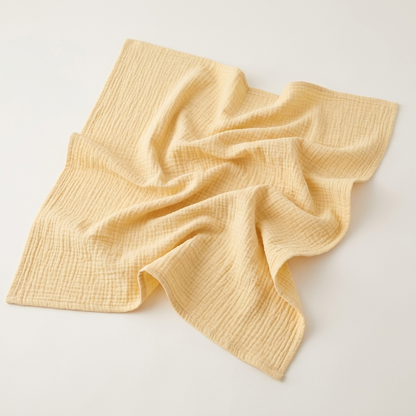 Premium organic cotton muslin swaddle blanket Golden Haze Light Yellow Lemon for newborns by Baby DukWear